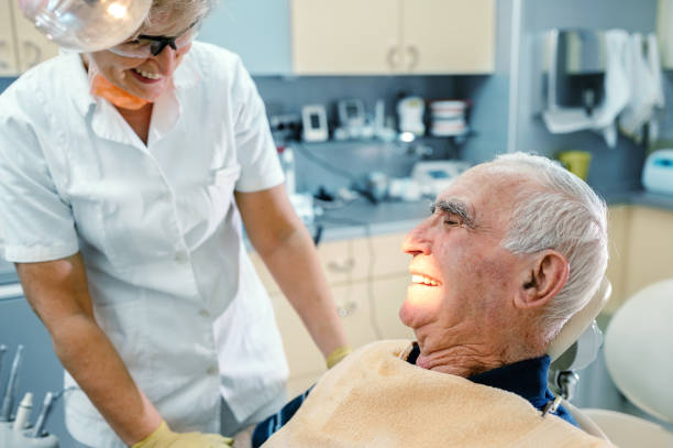 istock Senior man at the dentist 1185370260