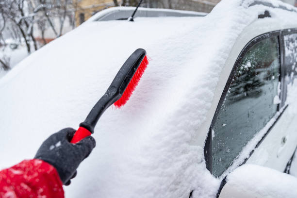 istock after blizzard car covered with snow cleaning concept 1185370442