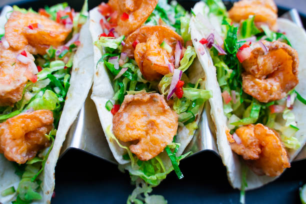 istock Spicy Shrimp Tacos with Avocado Salsa 1185371872