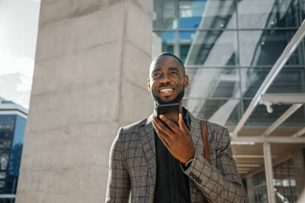 istock Businessman Using Smart Phone Outdoors 1185373524