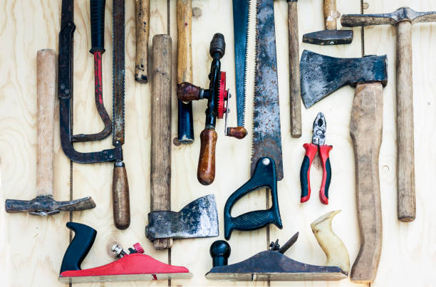 istock Set of vintage hand construction tools hammers on a wooden background, retro concept 1185376749
