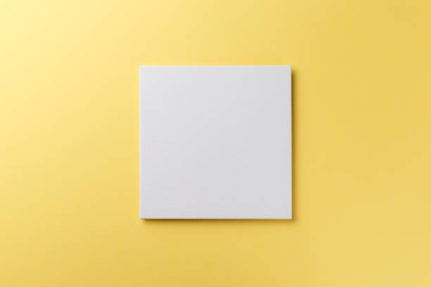 istock Creative layout made of paper blank on pastel on yellow background. Top view. Flat lay. Copy space. Colorful background. Minimal creative concept. Trendy color 1185377837