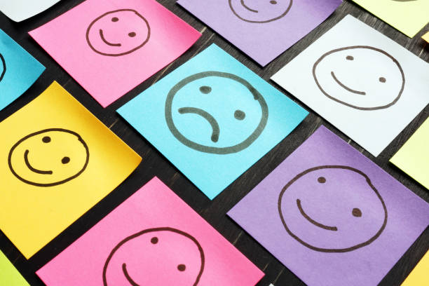 istock Unhappy face and drawn smiles faces. Satisfaction survey and customer service experience. 1185380126