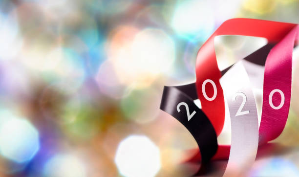 istock Overlapping Circles and silk ribbon with Happy New Year 2020 1185380974