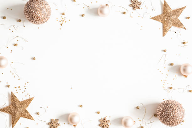 istock Christmas composition. Frame made of golden decorations on white background. Christmas, winter, new year concept. Flat lay, top view, copy space 1185382618