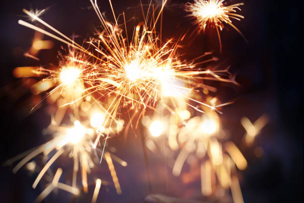 istock Abstract background blurry firework pyrotechnics and bokeh on the dark background for celebration concept 1185382731
