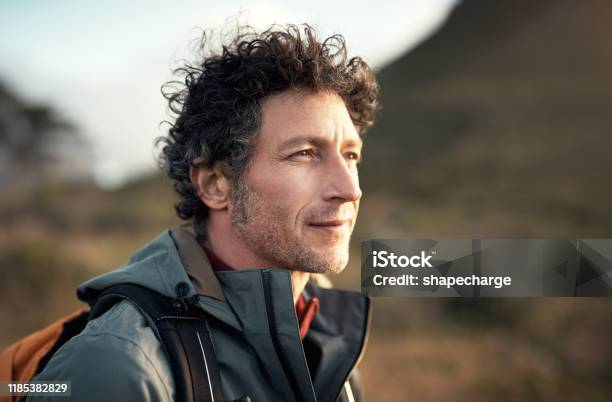 Hiking And Determination Go Hand In Hand Stock Photo - Download Image Now - Men, Contemplation, Mature Men