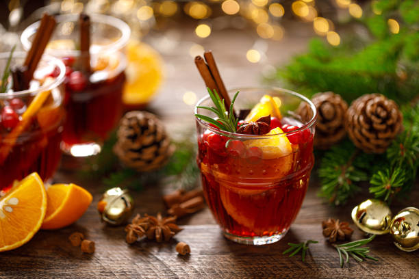 istock Christmas mulled wine. Traditional festive drink with decorations and fir tree