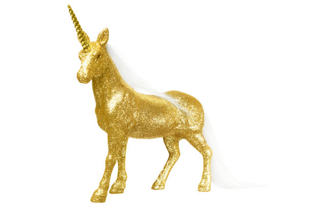Glitter gold unicorn isolated on white background.