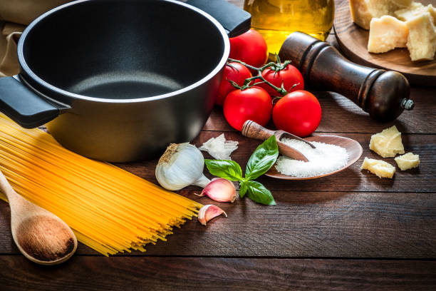 foto stock ingredienti pasta italiana - scoop in front of portion colors foto e immagini stock