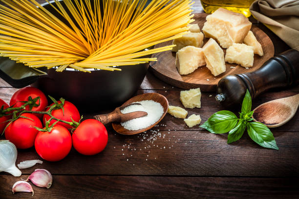 foto stock ingredienti pasta italiana - scoop in front of portion colors foto e immagini stock