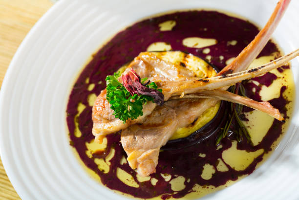 istock Lamb ribs served with slice of eggplant 1185386698