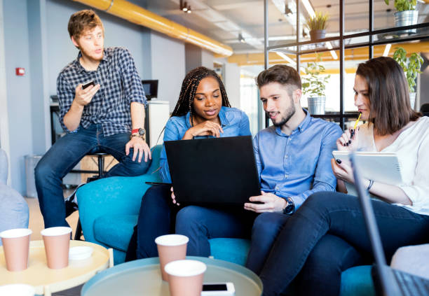 istock Young coworkers in modern office 1185386791