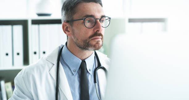 istock This is what doctoring in the computer age looks like 1185387842