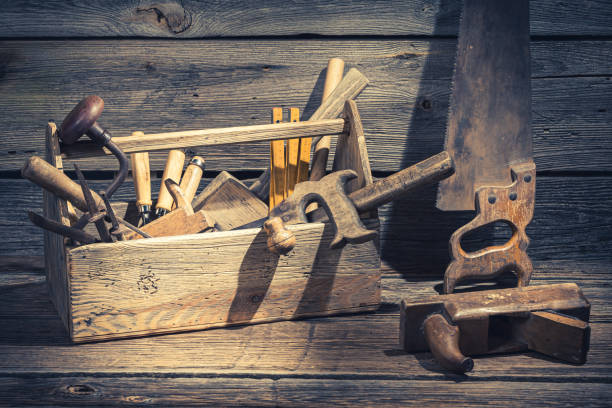 istock Closeup of joinery tool box in rustic wooden shed 1185392814