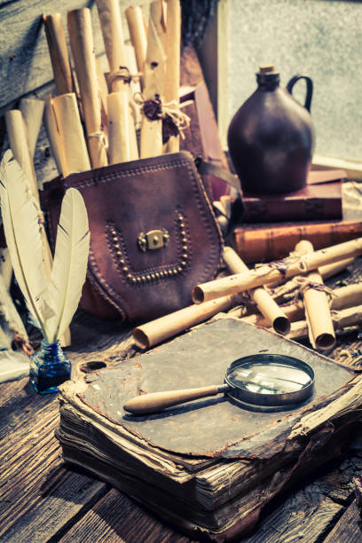 istock Vintage witcher labolatory with old scrolls and ingredients 1185394505