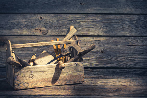 Old carpenters tool box in rustic wooden shed