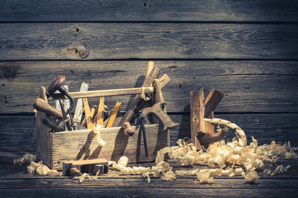 istock Old vintage carpenter drawing desk in rustic wooden shed 1185396387