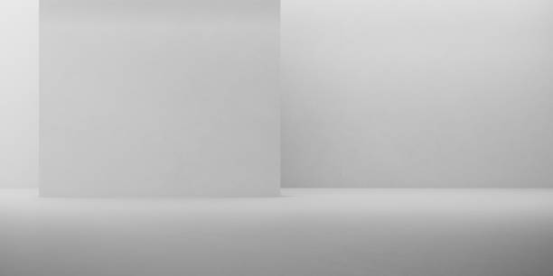istock Abstract of concrete interior with sun light cast the shadow on the wall ,Geometric structure design,Perspective of brutalism  architecture space, 3d rendering 1185397516