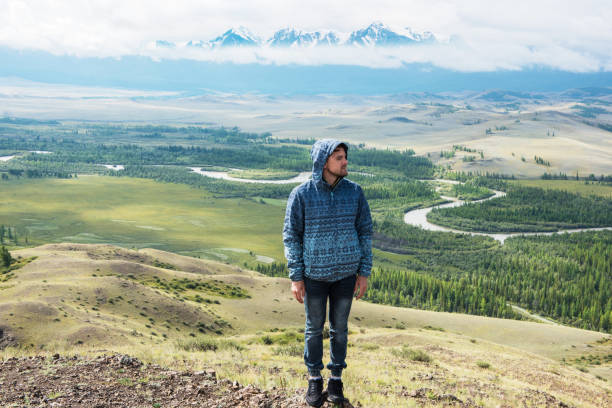 istock Relaxing man in Kurai steppe on North-Chui ridge 1185397954