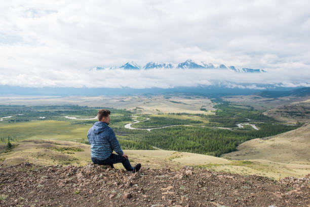 istock Relaxing man in Kurai steppe on North-Chui ridge 1185397981