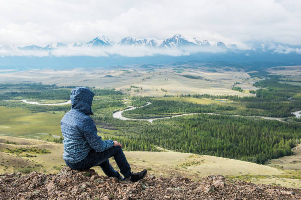 istock Relaxing man in Kurai steppe on North-Chui ridge 1185398025