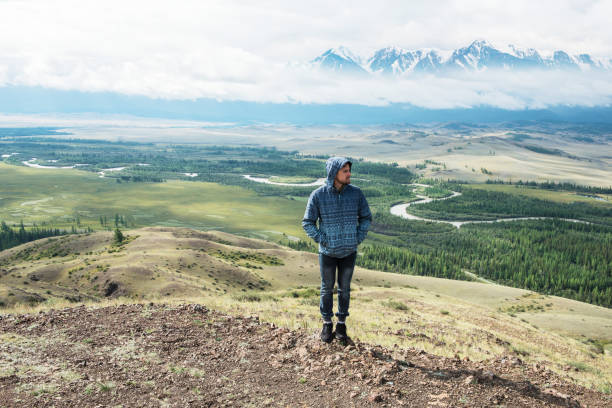 istock Relaxing man in Kurai steppe on North-Chui ridge 1185398041