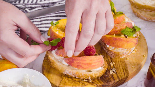 istock Making ricotta toasts with organic peaches 1185398136