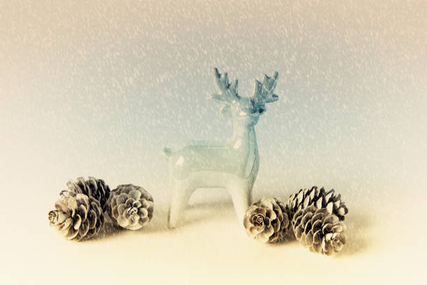istock Winter reindeer in a falling snow 1185398167