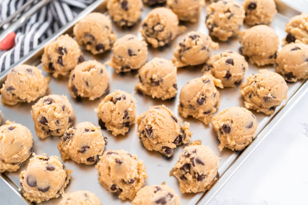 istock Homemade chocolate chip cookies dough scoops 1185398321