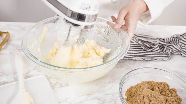 istock Mixing ingredients to make chocolate chip cookies. 1185398499