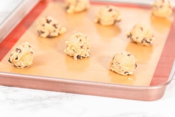 istock Homemade chocolate chip cookies dough scoops 1185398682