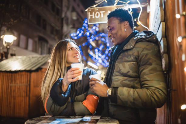 istock Diverse couple Christmas shopping 1185399721