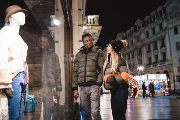 istock Diverse couple Christmas shopping 1185399737