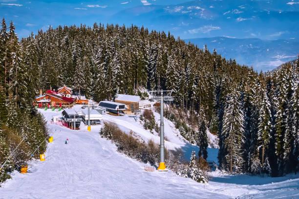istock Ski slope in Bansko, Bulgaria and skiers 1185401545