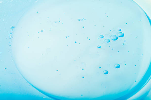 istock Oil bubbles in water, round abstract drops 1185402683