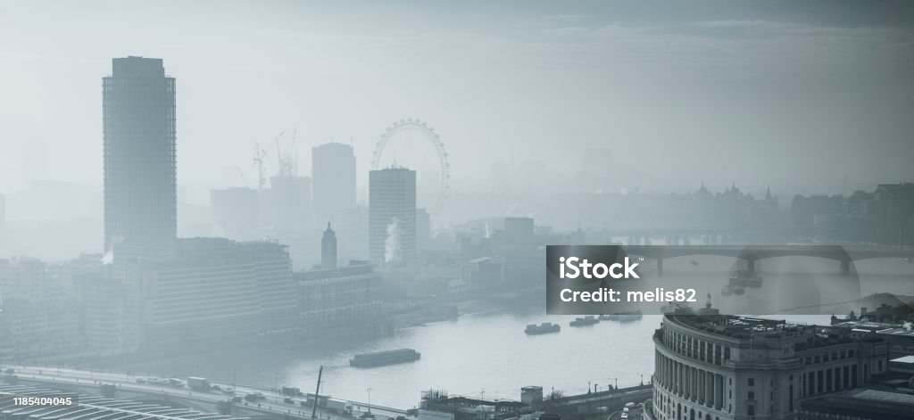 rooftop view over London on a foggy day from St Paul's cathedral, UK London - England Stock Photo