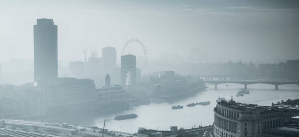 rooftop view over London on a foggy day from St Paul's cathedral, UK stock photo