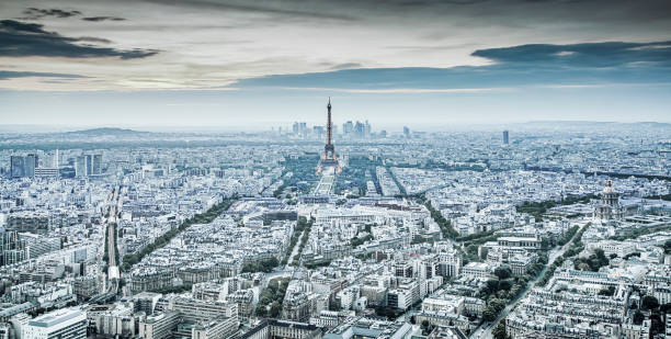 istock aerial view over Paris at sunset with iconic Eiffel tower 1185404090