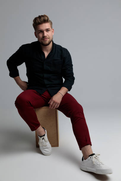 istock Charming fashion man looking away and smiling 1185404498