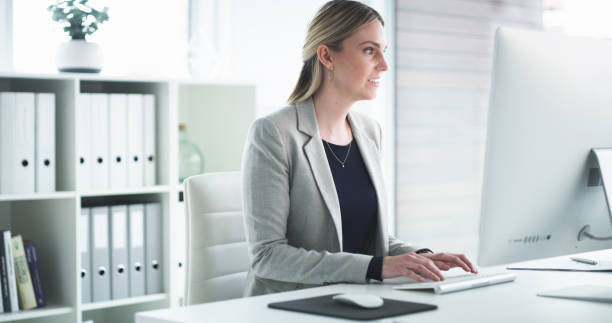 istock Submitting the last of her tasks online 1185404549