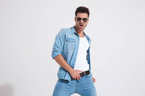 istock Angry casual man adjusting his belt and yelling 1185406938