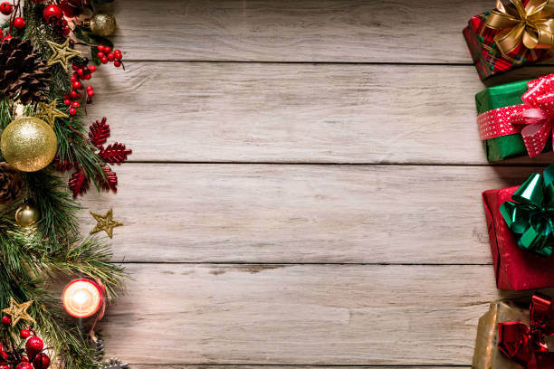 istock Christmas lights and decoration with presents making a frame with copy space. Christmas themes. 1185408343