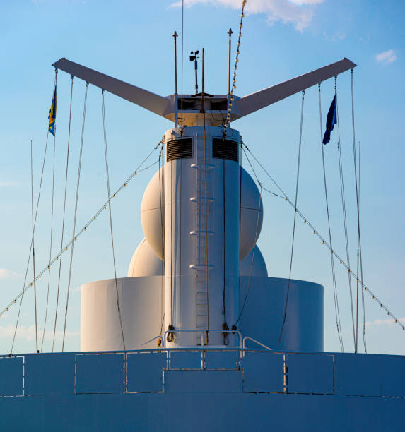 white color satellite antenna of cargo a ship and sun loungers on deck of cruise ship - sea safety antenna radar imagens e fotografias de stock