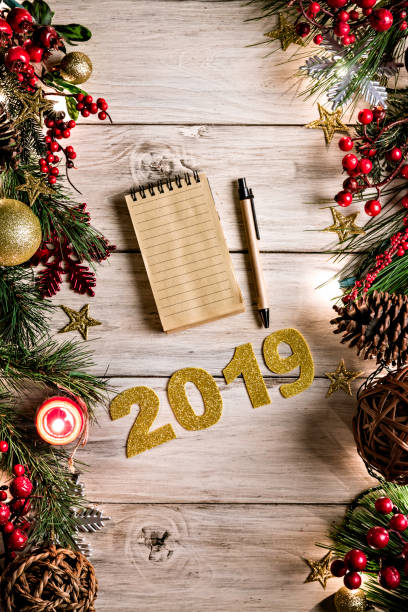 Christmas lights and decoration with presents making a frame with copy space. Christmas themes with new year 2019 sign.