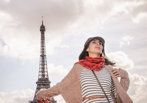 istock Happy woman in Paris in front of Eiffel Tower. 1185412761