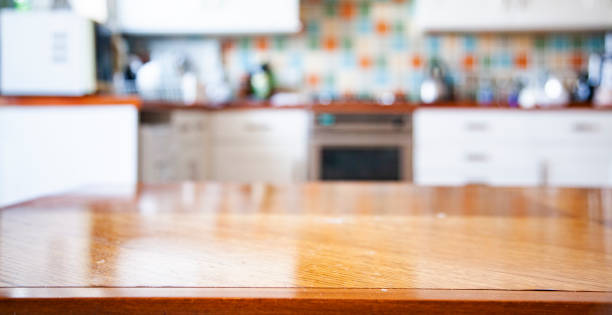 blurred kitchen interior with napkin on table