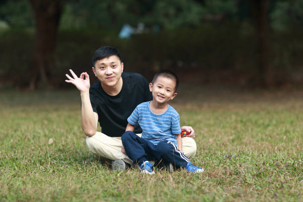 istock Happy Asian father and son 1185413374