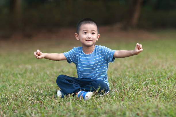 istock Cute children playing in the park 1185413382