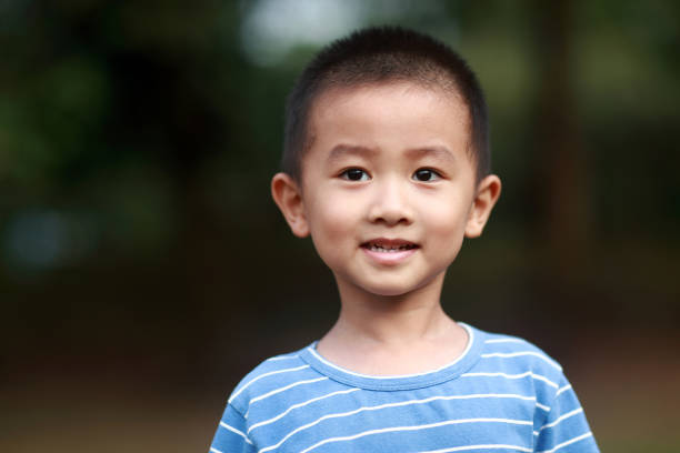 istock Cute children playing in the park 1185413517